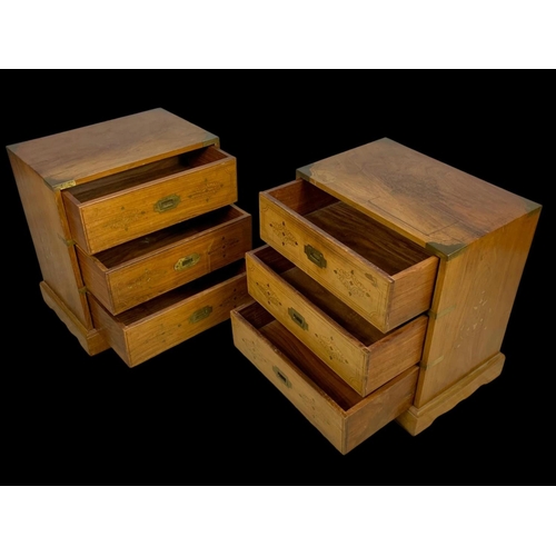 894 - A pair of rosewood campaign style brass inlaid 3 drawer bedsides. 49 x 33 x 50.5cm