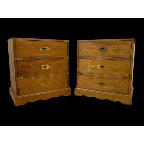 894 - A pair of rosewood campaign style brass inlaid 3 drawer bedsides. 49 x 33 x 50.5cm