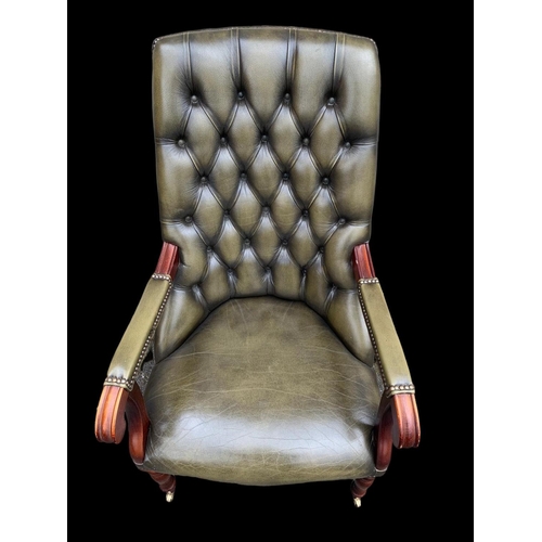 897 - A William IV style deep button leather armchair. 65 x 85 x 104cm.