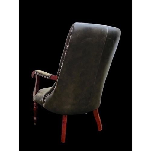 897 - A William IV style deep button leather armchair. 65 x 85 x 104cm.