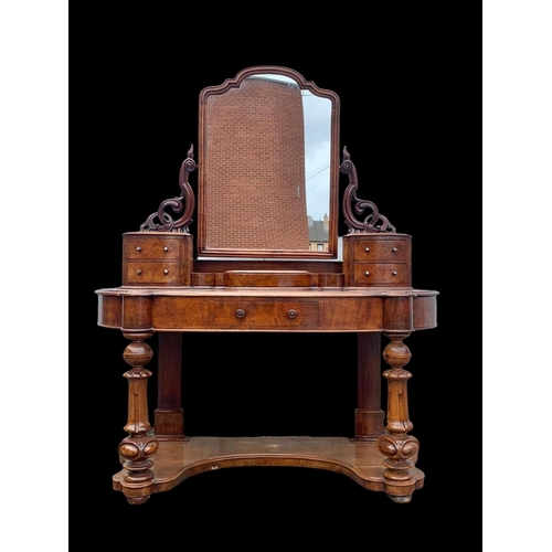 898 - A Victorian burr walnut Duchess dressing table. Circa 1870. 136 x 58 x 166cm