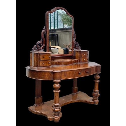 898 - A Victorian burr walnut Duchess dressing table. Circa 1870. 136 x 58 x 166cm