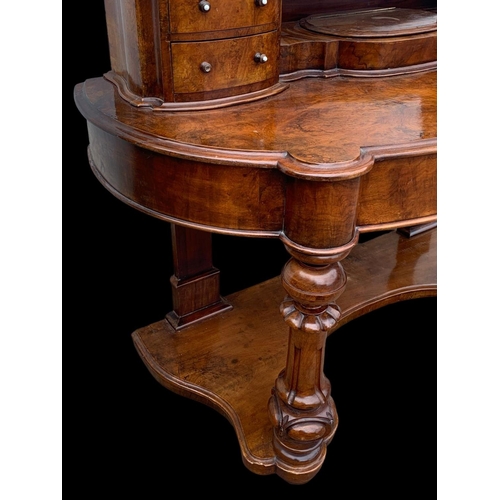 898 - A Victorian burr walnut Duchess dressing table. Circa 1870. 136 x 58 x 166cm