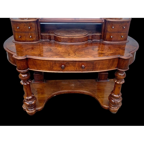 898 - A Victorian burr walnut Duchess dressing table. Circa 1870. 136 x 58 x 166cm