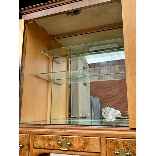 904 - An early Georgian style burr walnut cocktail cabinet, with 3 drawers and glass interior shelves. Cir... 