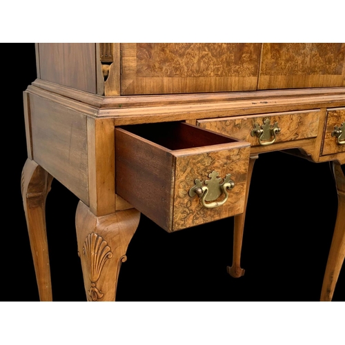 904 - An early Georgian style burr walnut cocktail cabinet, with 3 drawers and glass interior shelves. Cir... 