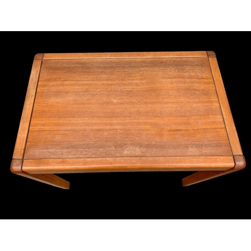 908 - A Danish teak nest of 3 tables. Mid century Denmark. Circa 1960-1970.