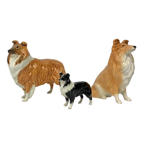 593 - 3 Beswick pottery dogs. Largest 19cm