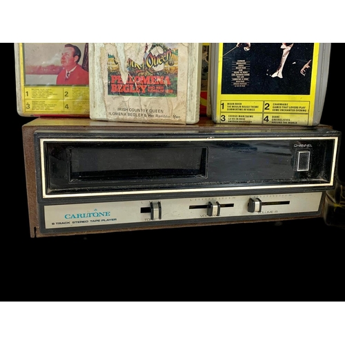 144 - A vintage Carltone 8 Track Stereo Tape Player with tapes.