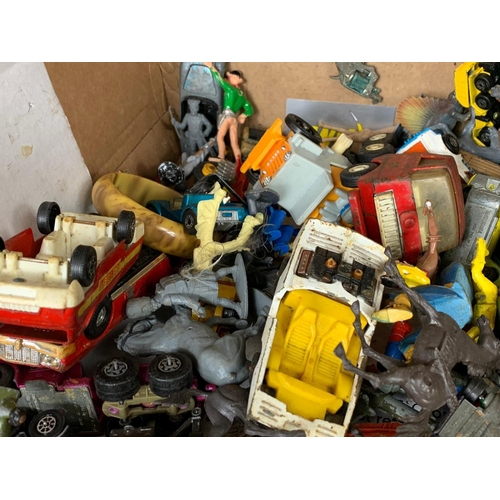 145 - A box of vintage toys/model cars and soldiers. Including tinplate tanks, Dinky, Corgi, Matchbox, pla... 