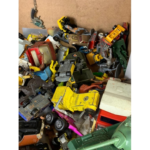 145 - A box of vintage toys/model cars and soldiers. Including tinplate tanks, Dinky, Corgi, Matchbox, pla... 