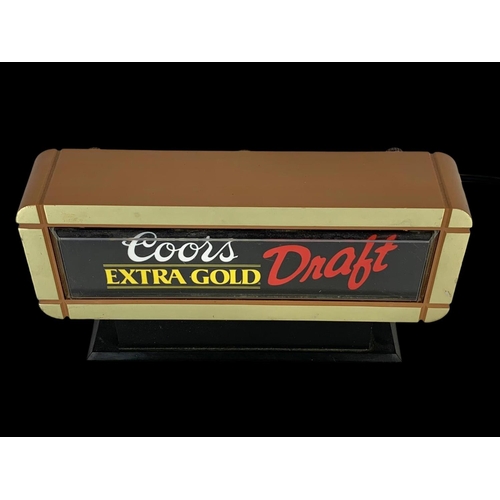 171 - A Coors Extra Gold Draft light up sign. 25 x 14cm.