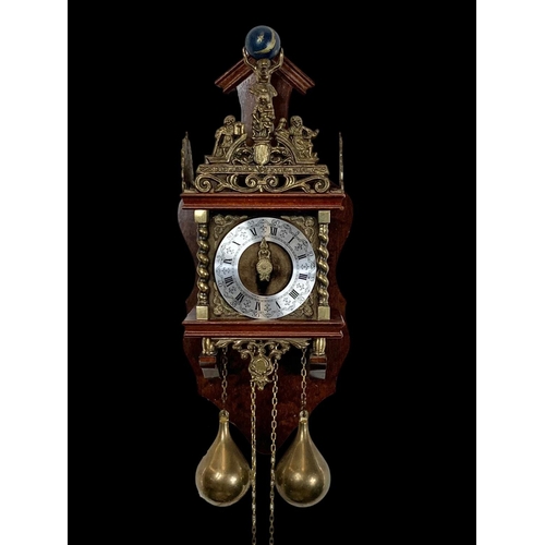 229 - A Dutch Canal wall clock with weights. 56cm