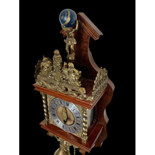 229 - A Dutch Canal wall clock with weights. 56cm