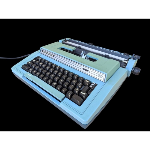 234 - Vintage Smith-Carona type writer in case, case measures 45x43cm