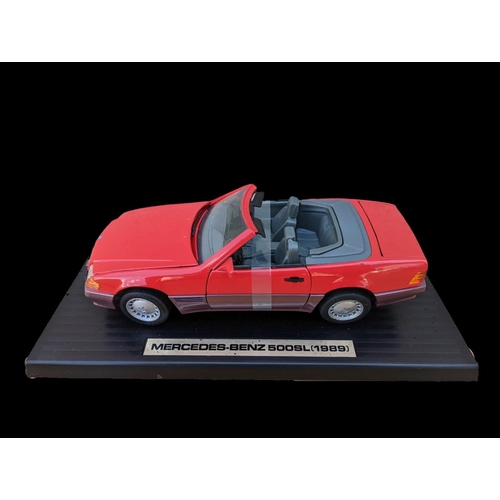 237 - 6 model cars etc, largest stand measures 35cm