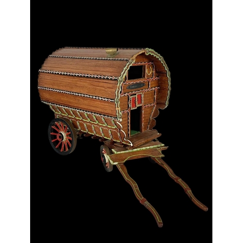 264 - A large Gypsy  caravan ornament. 67 x 35cm.