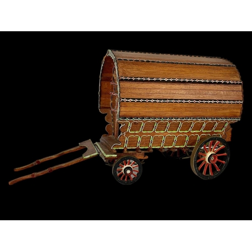 264 - A large Gypsy  caravan ornament. 67 x 35cm.