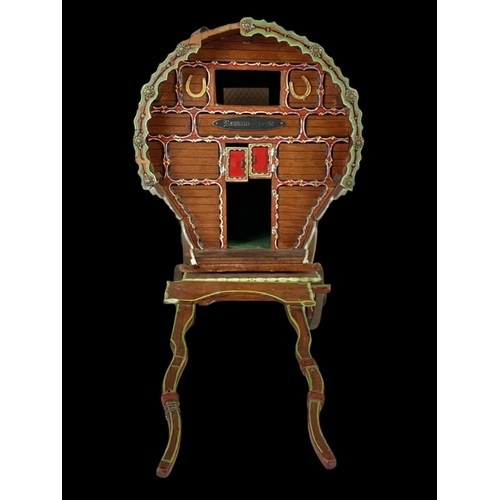 264 - A large Gypsy  caravan ornament. 67 x 35cm.