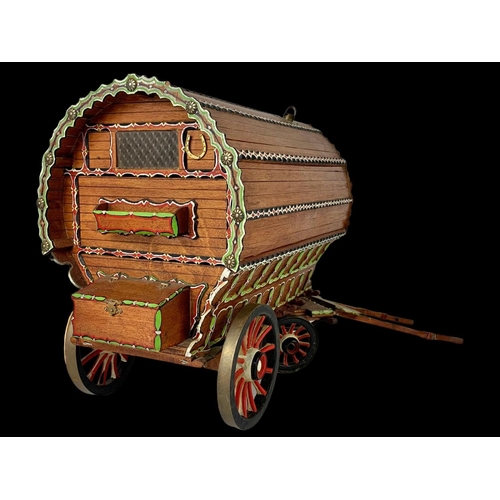 264 - A large Gypsy  caravan ornament. 67 x 35cm.