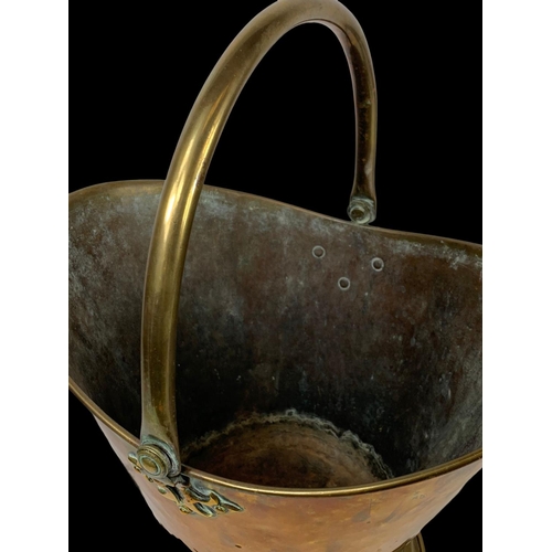 269 - A vintage brass coal bucket. 37 x 48cm including handle