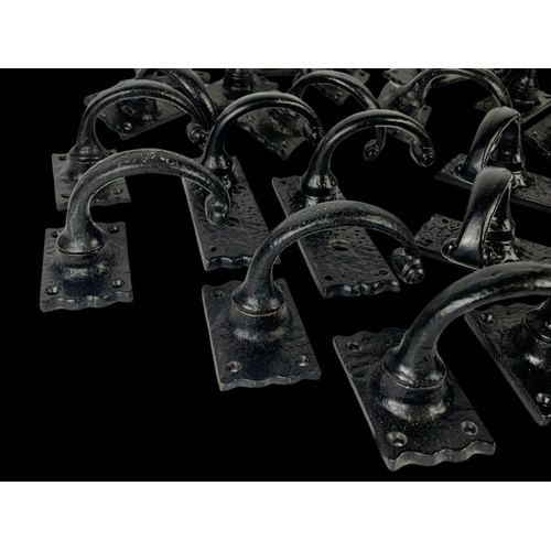 270 - A quantity of cast iron door handles