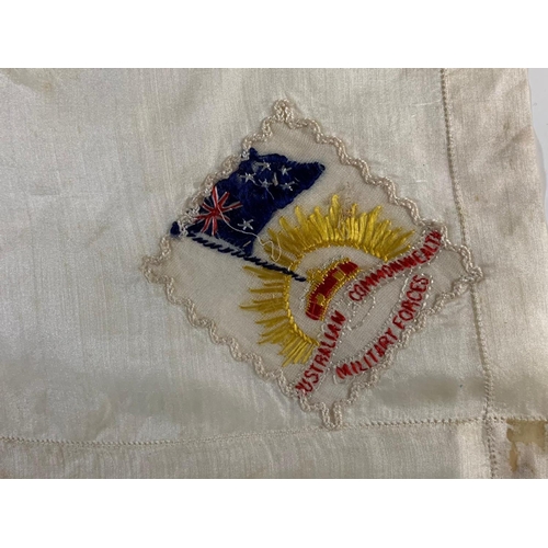 309 - A WWI silk pillow and 3 handkerchiefs. One saying Australian Commonwealth Forces. Frame measures 72 ... 