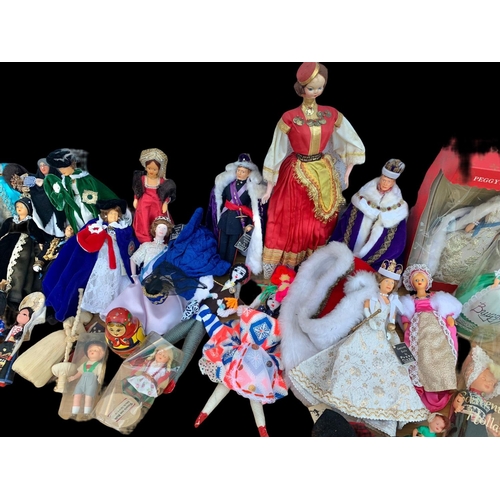 322 - A quantity of vintage dolls. Some Royal