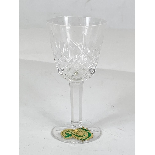 575 - A set of 6 Waterford crystal Lismore cut cordial glasses. 8.5cm.