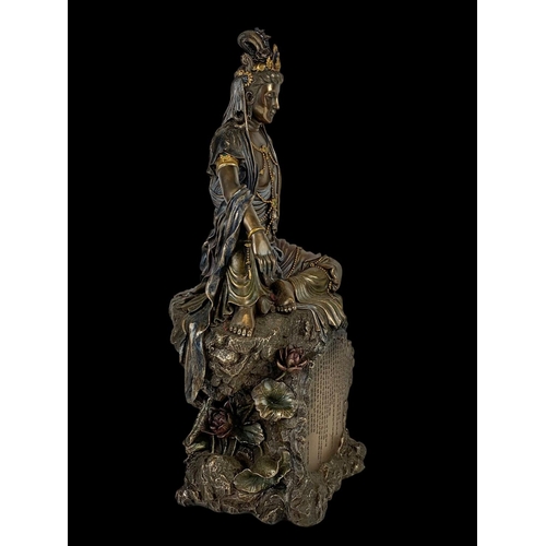 601 - A large resin figure. 39.5cm