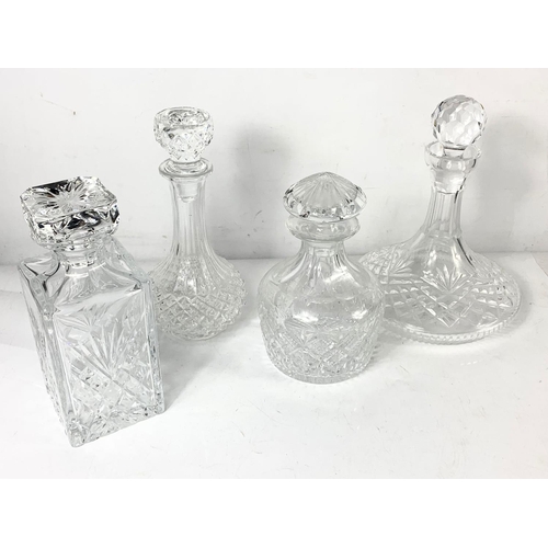 606 - 4 crystal decanters.