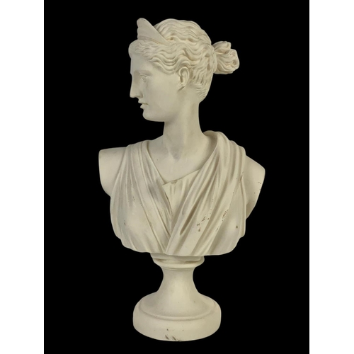 621 - A Grecian resin bust. 32cm.