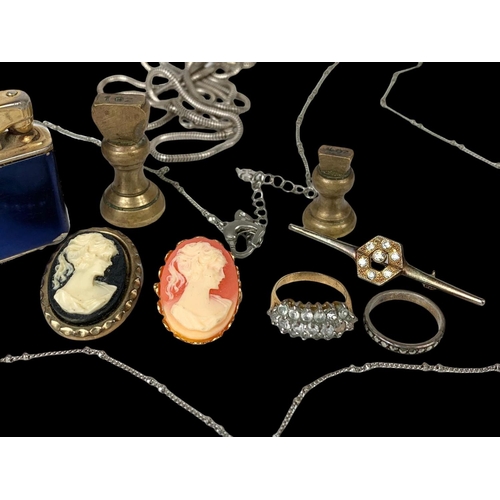 684 - A quantity of vintage costume jewellery and a vintage German lighter