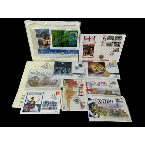 704 - A collection of £1-£2 coins with First Day Covers