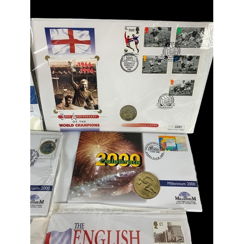 704 - A collection of £1-£2 coins with First Day Covers