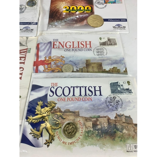 704 - A collection of £1-£2 coins with First Day Covers