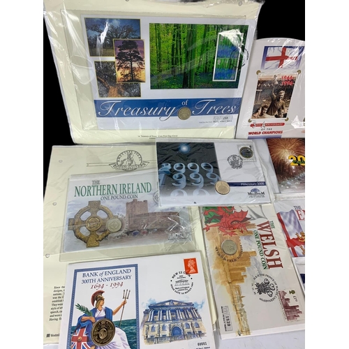 704 - A collection of £1-£2 coins with First Day Covers