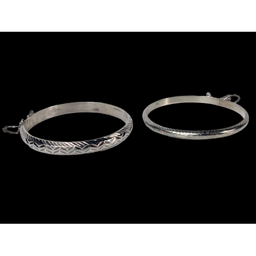 706 - 2 silver bangles