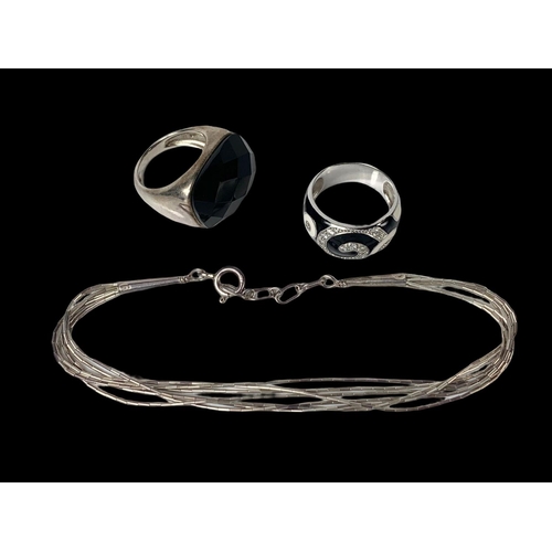 707 - 2 silver rings and a silver bracelet