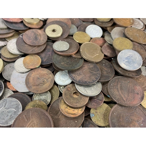 715 - A large quantity of British and foreign coins in a wooden trunk. Trunk measures 35 x 22 x 25cm.