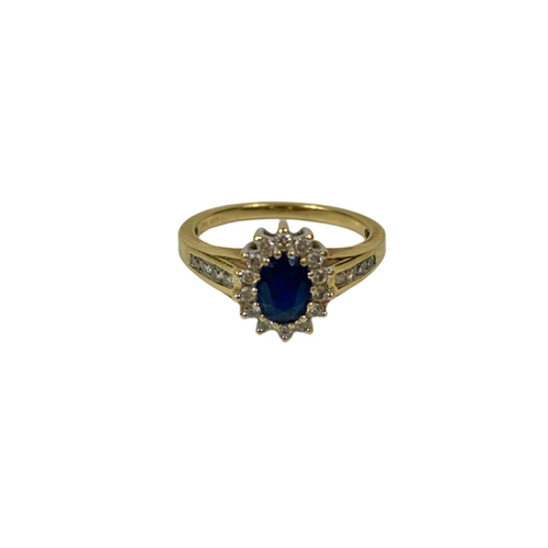 718 - 18ct gold, 0.33ct Diamond, Oval Cut Sapphire ring.