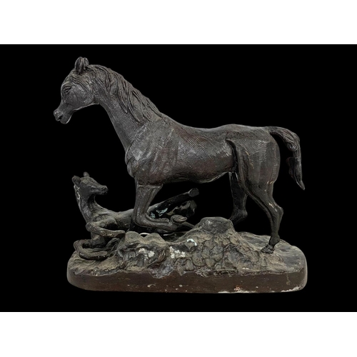 100a - A bronzed brass horse figure in the manner of  P. J. Mene. 24 x 21cm.