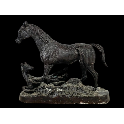100a - A bronzed brass horse figure in the manner of  P. J. Mene. 24 x 21cm.
