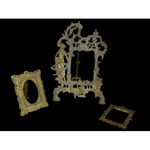 333 - A quantity of ornate brass photo frames in the 18th century style. Largest measures 31cm.