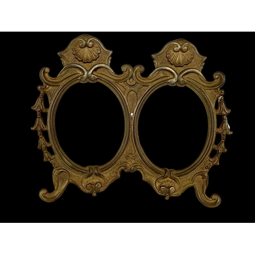 334 - 3 matching ornate brass photo frames. 23 x 19.5cm.