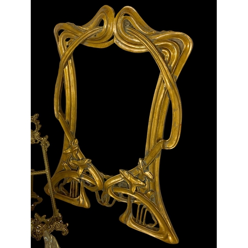 335 - Quantity of brass Art Nouveau style photo frames. Largest frame is gilt wood.  Largest 32 x 40cm.