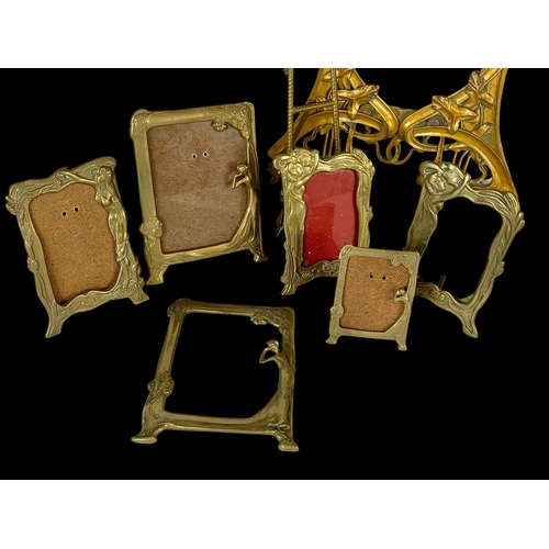 335 - Quantity of brass Art Nouveau style photo frames. Largest frame is gilt wood.  Largest 32 x 40cm.