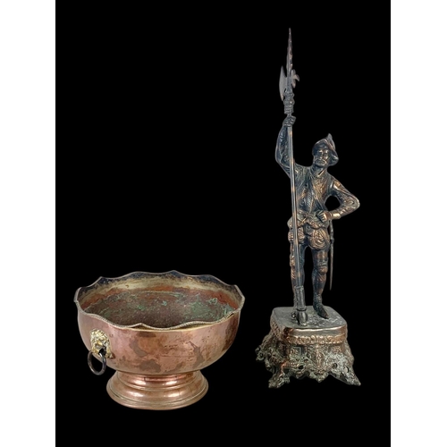 360 - A large 19th century spelter figure and a large 19th century copper punch bowl. Spelter figure measu... 