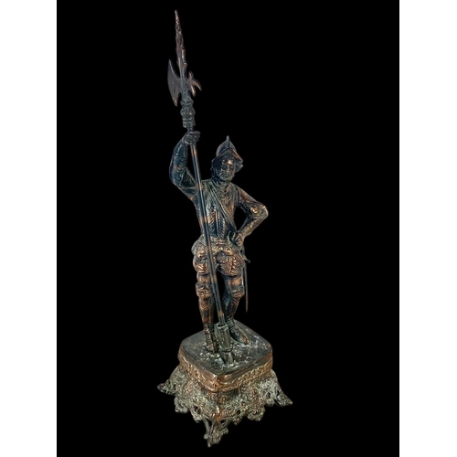 360 - A large 19th century spelter figure and a large 19th century copper punch bowl. Spelter figure measu... 