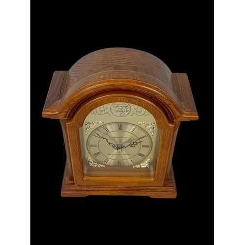 369 - A barometer and a mantle clock. Barometer measures 39cm.